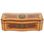 NINETEENTH-CENTURY BRASS MOUNTED WALNUT AND MARQUETRY GLOVE BOX of serpentine form 9 cm. high; 28