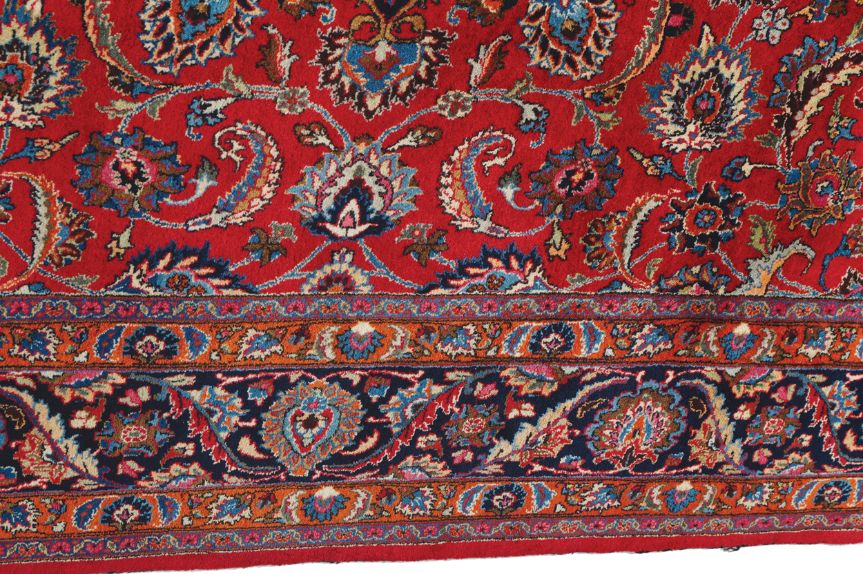 NORTHEAST PERSIAN CARPET on rich red ground with navy border; includes weaver’s signature 402 x - Image 3 of 9