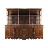 LARGE EIGHTEENTH-CENTURY BRASS MOUNTED HARDWOOD COLONIAL DRESSER the superstructure with a moulded