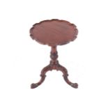 LATE NINETEENTH-CENTURY MAHOGANY CHIPPENDALE WINE TABLE the circular pie-crust serpentine shaped