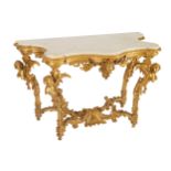 EIGHTEENTH-CENTURY CARVED GILTWOOD CONSOLE TABLE the serpentine white marble top above a moulded