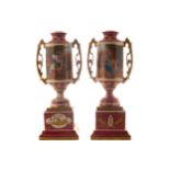 PAIR OF LARGE NINETEENTH-CENTURY VIENNA PORCELAIN URNS each with intricate scroll handles and