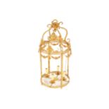 LARGE EDWARDIAN BRASS HALL LANTERN of cylindrical form, within a ribbon tied frame, below floral