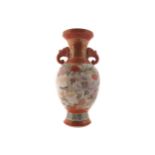 NINETEENTH-CENTURY JAPANESE KUTANI VASE of baluster form with elephant trunk scroll handles with