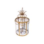 LARGE LATE NINETEENTH-CENTURY BRASS AND CURVED PANELLED LANTERN of circular cylindrical form,