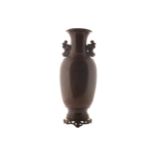 LARGE NINETEENTH-CENTURY ORIENTAL SILVER INLAID BRONZE VASE of baluster form with Fo dog scroll