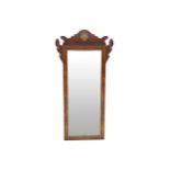 EIGHTEENTH-CENTURY WALNUT AND PARCEL GILT FRAMED PIER MIRROR the rectangular plate within a