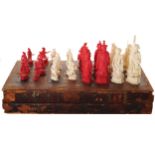 CHINESE QING PERIOD SET OF CARVED CHESS PIECES with chess board Board: 20 cm. x 38 cm.; Pieces: 10