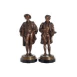 SALMSON pair of bronze figures, one representing an artist, the other a writer 47 cm. high and 46