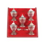 A SILVER MOUNTED CUT GLASS CONDIMENT SET. LONDON & BIRMINGHAM 1978 A set of five diamond facetted