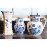 GROUP OF THREE DELFT BLUE AND WHITE VASES 23 cm. high and lower