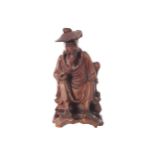 CHINESE QING PERIOD CARVED HARDWOOD FIGURE OF AN IMMORTAL 17 cm. high