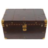 BRASS AND LEATHER BOUND TRAVELLING TRUNK 90 cm. wide; 55 cm. deep; 50 cm. high