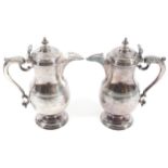 AN IMPORTANT PAIR OF IRISH SILVER COVERED EWERS, THOMAS WALKER, DUBLIN 1741 A fine pair of