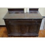 EDWARDIAN MAHOGANY BLANKET CHEST of one long drawer, above two panelled doors, raised on bracket