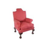 DUBLIN EDWARDIAN PERIOD MAHOGANY AND UPHOLSTERED ARMCHAIR raised on acanthus leaf carved cabriole