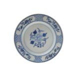 CHINESE BLUE AND WHITE PLATE centred by a chrysanthemum 26.5 cm. diameter