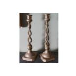 PAIR OF NINETEENTH-CENTURY BRASS SPIRAL STEMMED CANDLESTICKS 28 cm. high (2)