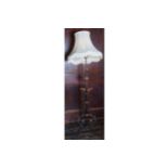 EDWARDIAN WROUGHT IRON AND COPPER TELESCOPIC STANDARD LAMP AND SHADE 150 cm. high