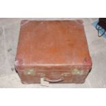 LEATHER BOUND TRUNK 51 cm. wide; 43 cm. deep; 33 cm. high