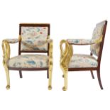 PAIR OF NAPOLEON III PERIOD MAHOGANY AND PARCEL GILT LIBRARY CHAIRS each with a panelled upholstered