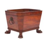 WILLIAM IV PERIOD MAHOGANY LOG BOX of sarcophagus form raised on claw feet 60 cm. wide; 42 cm. deep;