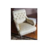 PAIR OF NINETEENTH-CENTURY UPHOLSTERED SCROLL BACK LIBRARY CHAIRS each raised on turned legs to