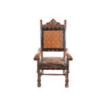 LATE 19TH CENTURY WALNUT AND TOOLED LEATHER UPHOLSTERED CEREMONIAL CHAIR 127 cm. high; 70 cm.