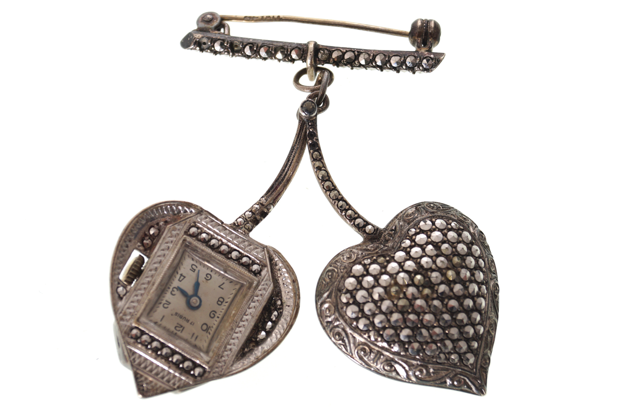 ART DECO SOLID SILVER AND MARCASITE SET PENDANT WATCH, CIRCA 1930 working