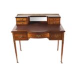 EDWARDIAN ROSEWOOD AND MARQUETRY WRITING DESK the tooled leather inset top below a mirror panelled