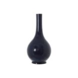 CHINESE DEEP BLUE-GLAZED BOTTLE-SHAPED VASE Imperial six-character seal mark of Qianlong (1736-