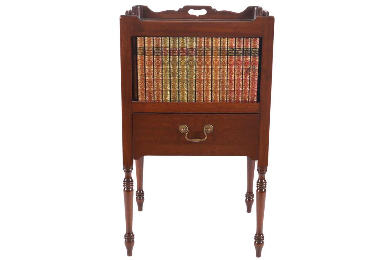 PAIR OF GEORGE III STYLE MAHOGANY TRAY TOP PEDESTALS each with a tambour faux book panelled door,