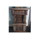 NINETEENTH-CENTURY PROFUSELY CARVED OAK HANGING WALL CABINET 75 cm. wide; 50 cm. deep; 117 cm. high