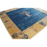 NORTHEAST PERSIAN CARPET royal blue field with flower vase, ivory border 297 x 301 cm.