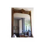 LARGE NINETEENTH-CENTURY CARVED GILT WOOD FRAMED OVER MANTLE MIRROR the rectangular plate with
