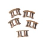 GROUP OF FIVE WALL MOUNTED MAHOGANY AND CAST-IRON TACK RACKS Musgraves of Belfast 15 cm. wide