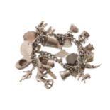 VINTAGE SILVER 24 CHARM BRACELET with safety catch, 77 grams