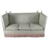 DAMASK UPHOLSTERED KNOWLE SETTEE with drop ends 104 cm. high; 201 cm. wide; 90 cm. deep