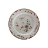 EIGHTEENTH-CENTURY FAMILLE ROSE PLATE with floral decoration 23 cm. diameter