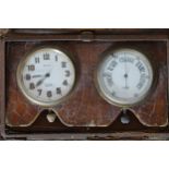 OFFICERÕS TRAVELLING CLOCK AND BAROMETER in a leather case