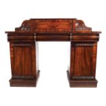 WILLIAM IV PERIOD MAHOGANY PEDESTAL SIDEBOARD the rectangular top, below a raised scroll end back,