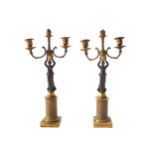 PAIR OF FRENCH EMPIRE BRONZE AND ORMOLU FIGURAL CANDELABRAS