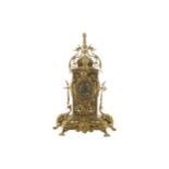 NINETEENTH-CENTURY FRENCH BRASS CASED MANTLE CLOCK in the form of a cartel mounted on a square