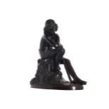 NINETEENTH-CENTURY BRONZE FIGURE of a young shepherd boy seated on a rocky mound gazing at a mouse