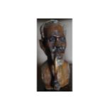 CARVED AFRICAN HARDWOOD BUST of a man smoking a pipe