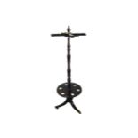 REGENCY PERIOD MAHOGANY COMBINATION HAT, COAT AND STICK STAND raised on a sabre legged pod,