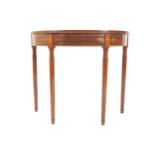 REGENCY PERIOD MAHOGANY AND BOXWOOD INLAID HALL TABLE the demi-lune shaped top, above a conforming