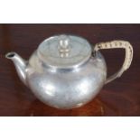 SMALL SILVER TEAPOT with hammered decoration 9 cm. high