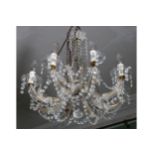 EIGHT BRANCH CRYSTAL CHANDELIER 45 cm. high; 50 cm. diameter