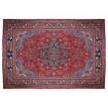 NORTHEAST PERSIAN CARPET red ground, navy border, central medallion, turqoise cartouches 295 x 390